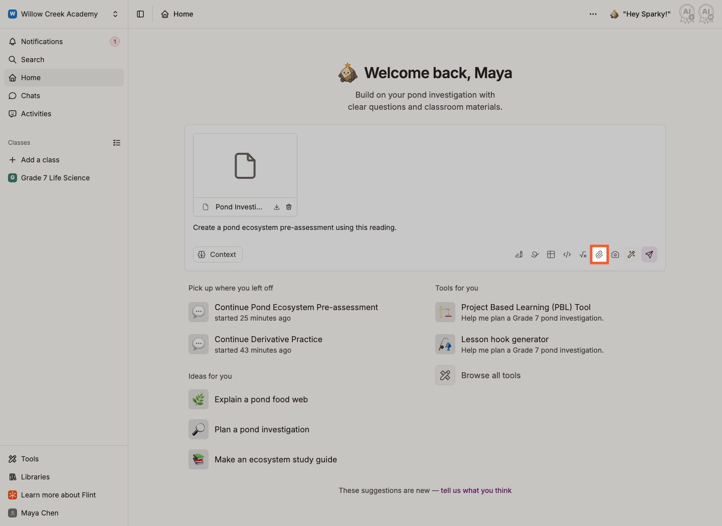 The paperclip icon highlighted in the message box for attaching files