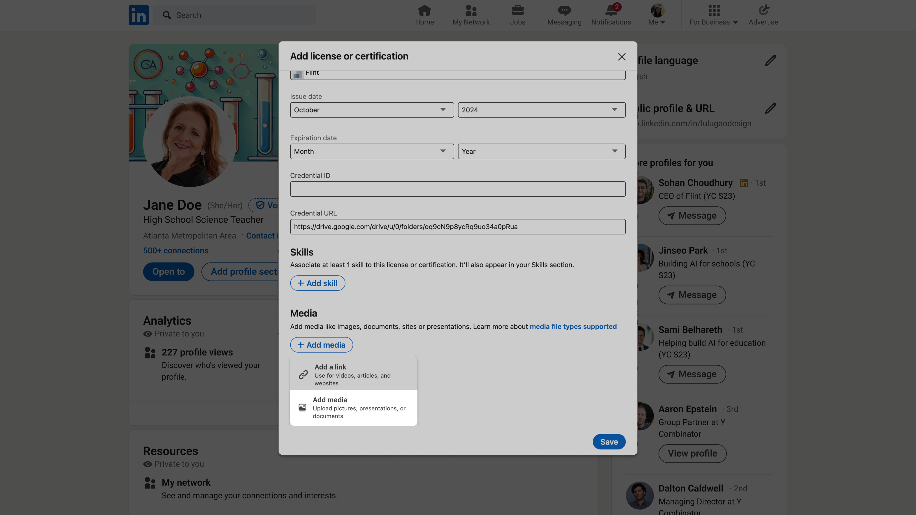 Add media menu open in the Media section, with Add a link and Add media options